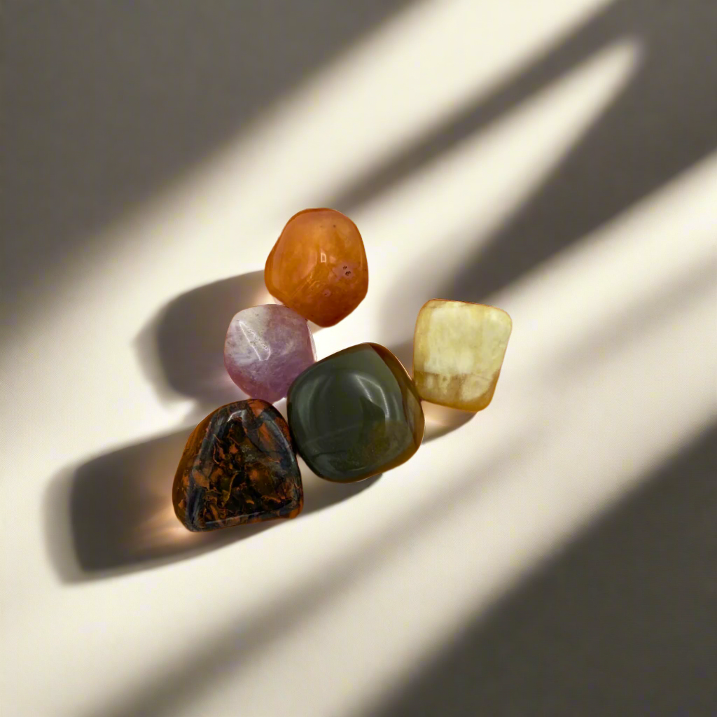A collection of 5 polished crystals from the he 'Motivation Crystal Mojo Bag'