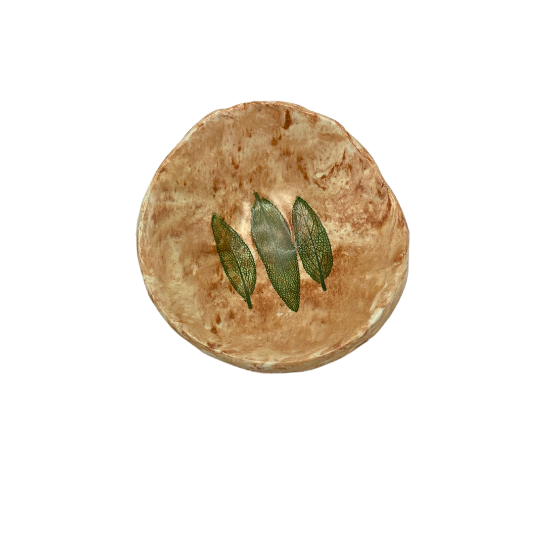 Top view of small leaf trinket dish one with a tan/brown color with 3 leaf pattern on white background