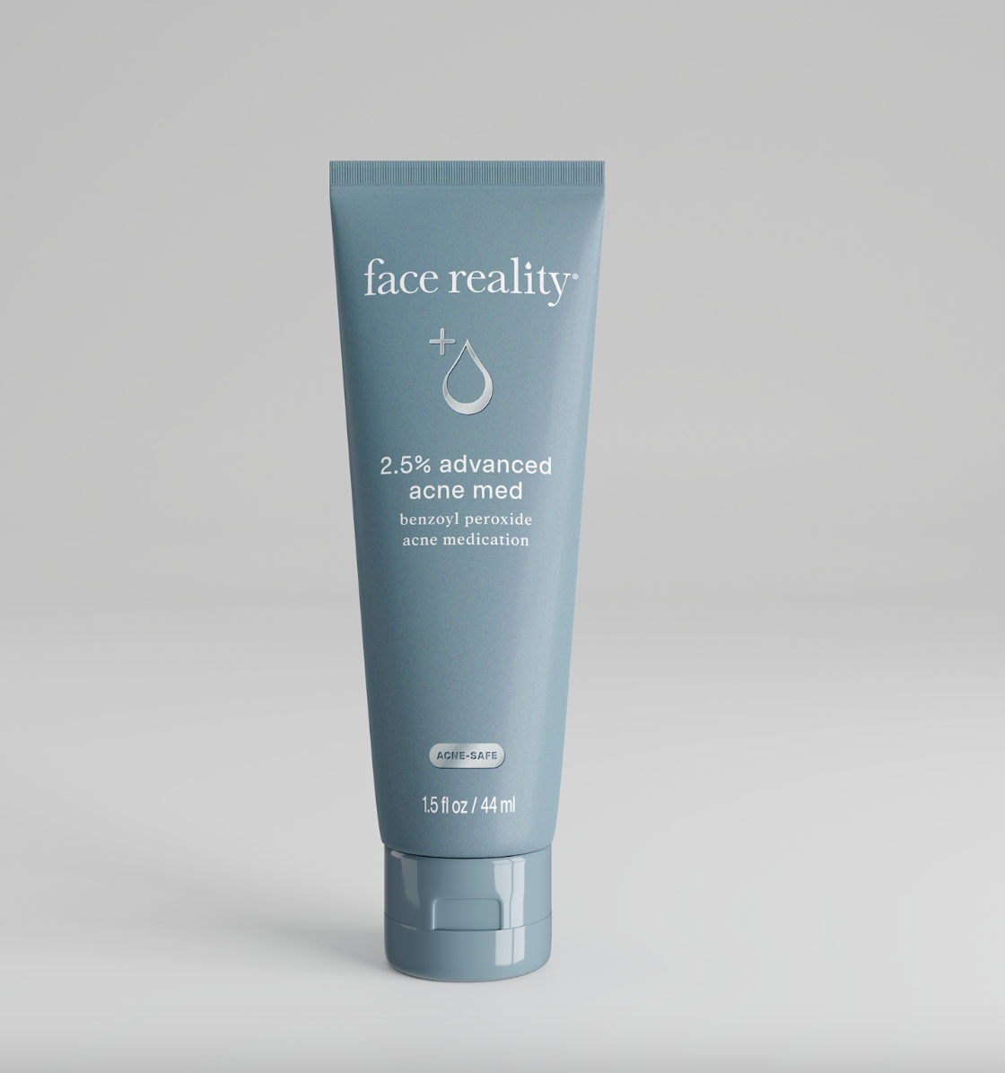 A tube of Face Reality 2.5% Advanced Acne Med, which is a benzoyl peroxide acne treatment.
