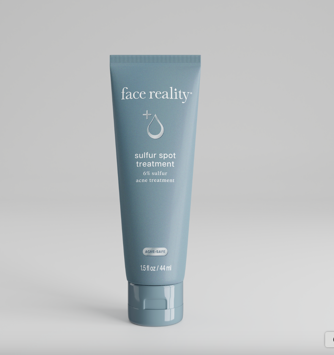 A tube of Face Reality Sulfur Spot Treatment, with blue and white labeling, designed for acne skincare.