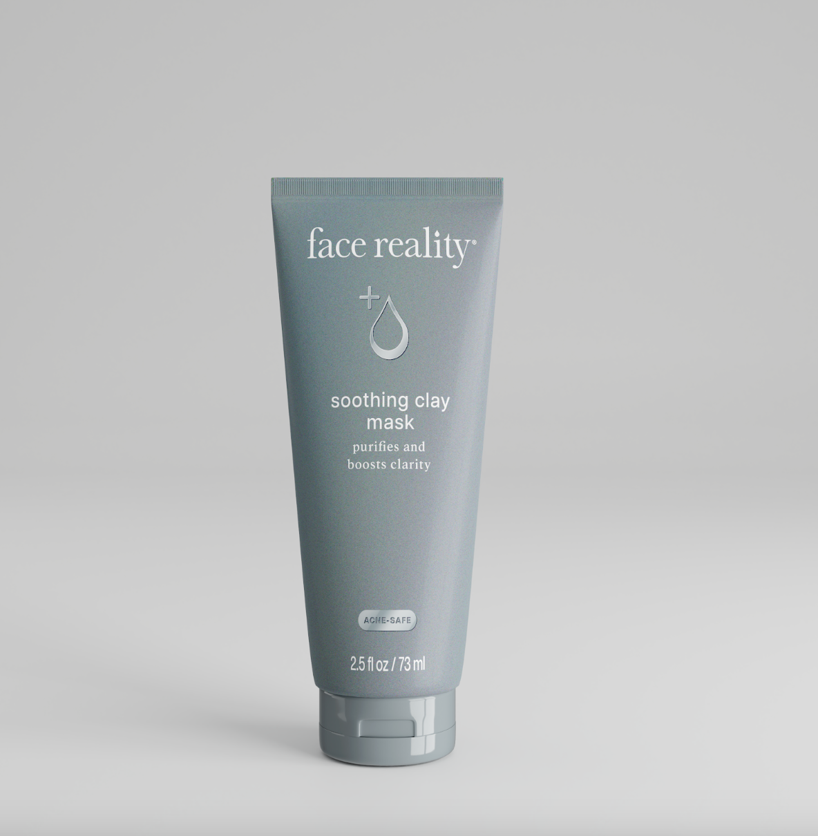 A tube of Face Reality Soothing Clay Mask against a neutral background.