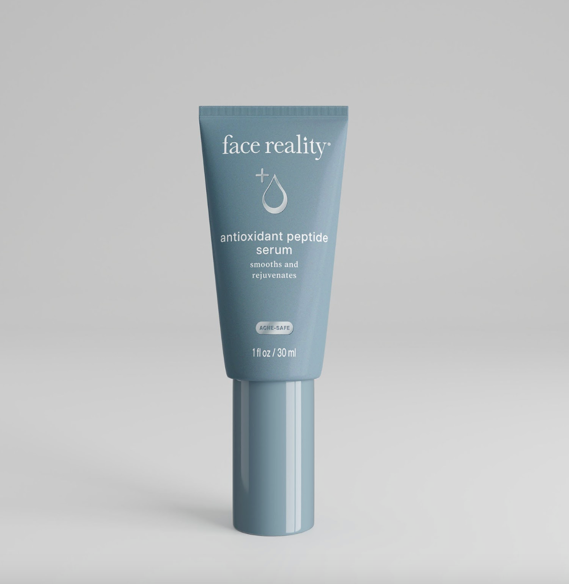 A tube of Face Reality Antioxidant Peptide Serum against a neutral background.